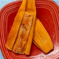 Homemade Traditional Tamales (3) · Pork or Chicken. Served in  a corn Husk.
