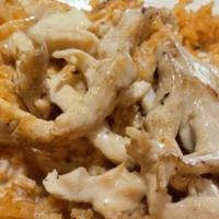 Grilled Chicken With Rice · Slices of chicken breast, grilled, over a bed of rice, topped with nacho cheese, sprinkled w...