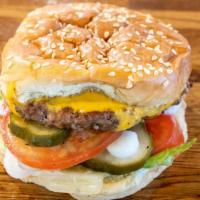 Angus Beef (Big) · 719 cal. 1/3 lb. Patty, house sauce, leaf lettuce, Roma tomato, shaved onions, pickles, Amer...