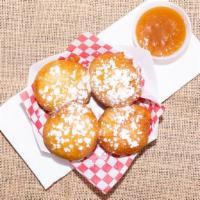 Fried Oreos · Every bit as amazing as it sounds. Oreo cookies hand-battered in our funnel cake batter and ...