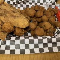 Catfish · (5) catfish strips served with tartar sauce, (2) hush puppies, coleslaw, fries and a dinner ...