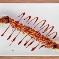 Godzilla Roll · 10 Pieces
In: eel, spicy crab, masago, avocado and cream cheese
Out: deep fried red snapper ...