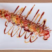 Kim'S Roll · Inside: Spicy Tuna &  Fried Shrimp. Top: Tuna, Salmon, Avocado, Eel Sauce and Fruit Sauce