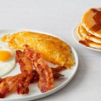 Bacon Or Sausage & Eggs · Two eggs, any style with 4 bacon strips, or four  links or two sausage patties. Served with ...