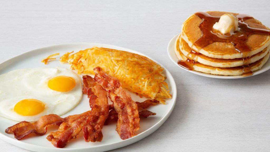 Bacon Or Sausage & Eggs · Two eggs, any style with 4 bacon strips, or four  links or two sausage patties. Served with three fluffy pancakes & hash browns or grits.