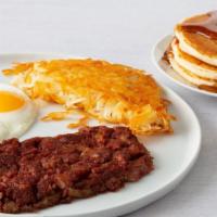 Corned Beef Hash & Eggs · Our Traditional Corned Beef Hash served with 2 eggs, choice of hash browns or grits & 3 fluf...