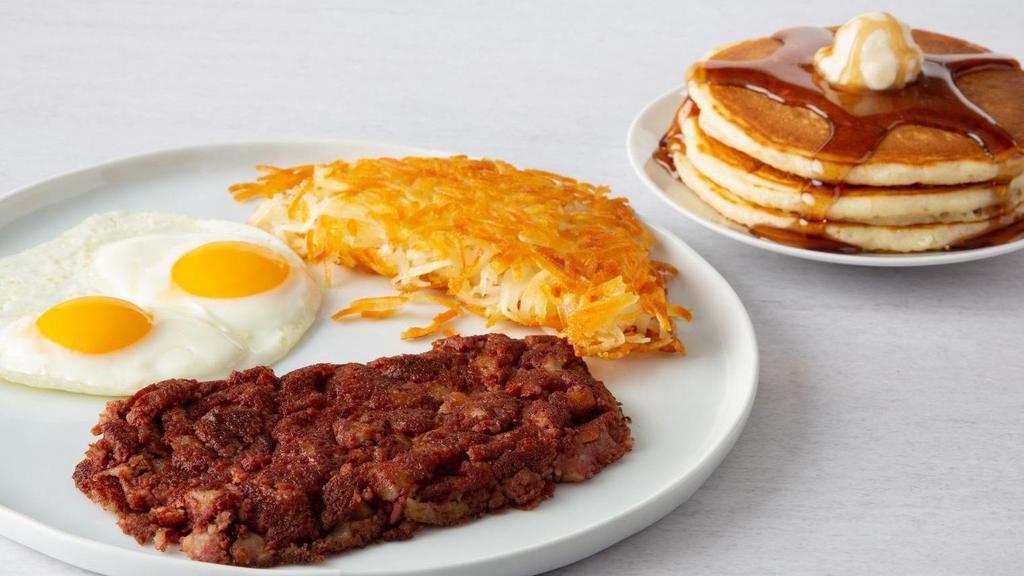 Corned Beef Hash & Eggs · Our Traditional Corned Beef Hash served with 2 eggs, choice of hash browns or grits & 3 fluffy buttermilk pancakes