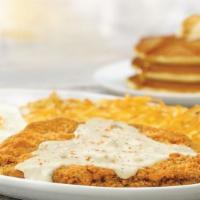 Chicken Fried Steak & Eggs · A 1/2 pound of Chicken Fried Steak topped with savory country sausage gravy served with 2 eg...