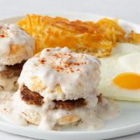 Biscuits & Gravy · 2 eggs served with grilled sausage patties set inside 2  fluffy buttermilk biscuits topped w...