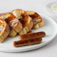French Toast Combo · Four slices of vanilla battered French bread served with 2 slices of bacon or 2 sausage link...
