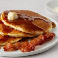 Pancake Combo · 3 fluffy buttermilk pancakes served with a choice of 2 strips of bacon or sausage and 1 egg