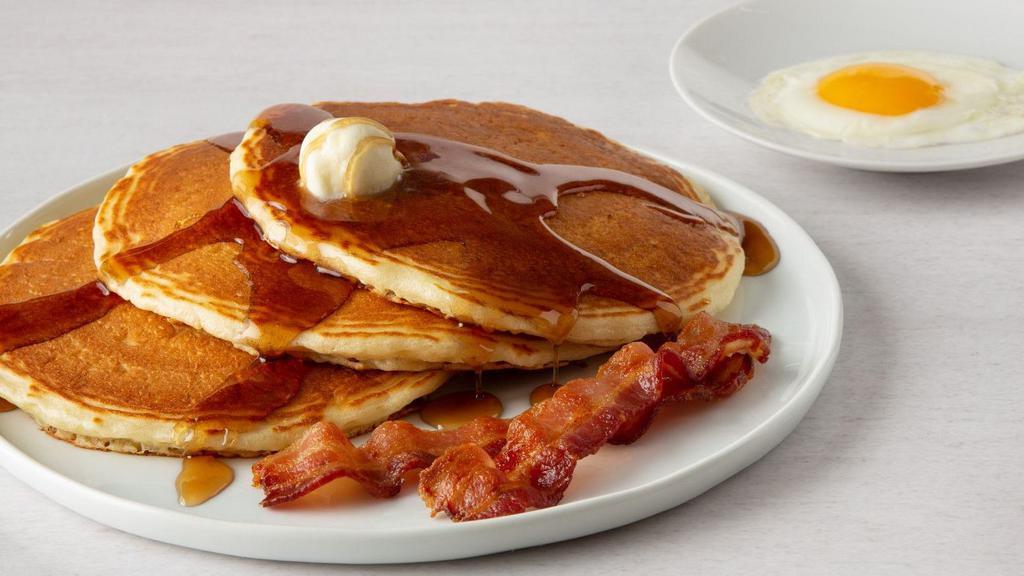 Pancake Combo · 3 fluffy buttermilk pancakes served with a choice of 2 strips of bacon or sausage and 1 egg