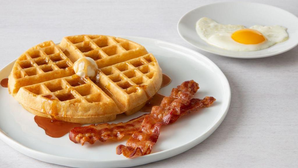 Waffle Combo · One egg any style with a choice of 2 strips of bacon or sausage