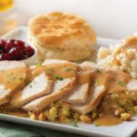 Roasted Turkey Dinner · Roasted Turkey served with mashed potatoes , stuffing and cranberry sauce. No other side cho...