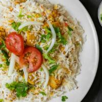 Chicken Biryani · Basmati rice and chicken.