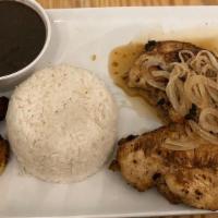 Bistec De Pollo Platter · Chicken breast with mojo citrus flavors topped with sautéed onion. Served with white rice, b...