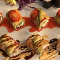 Sushi Tray · Serves 10 - 15 people, includes yum yum roll and California roll.