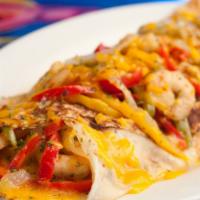James Crepe · Shrimp, Louisiana crabmeat, onions and bell peppers with cheese.