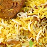 Lamb Biryani · Basmati rice with lamb and spices steamed together.