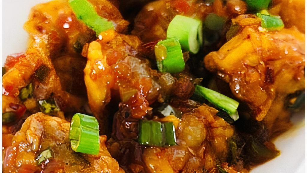 Veg Manchurian · Veggies fried and tossed in Manchurian sauce.