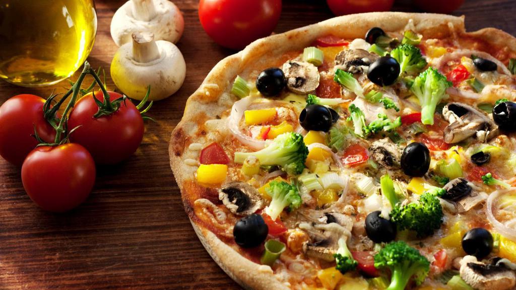 Veggie Pizza · Black olives, green pepper, onion, mushroom, and tomato.