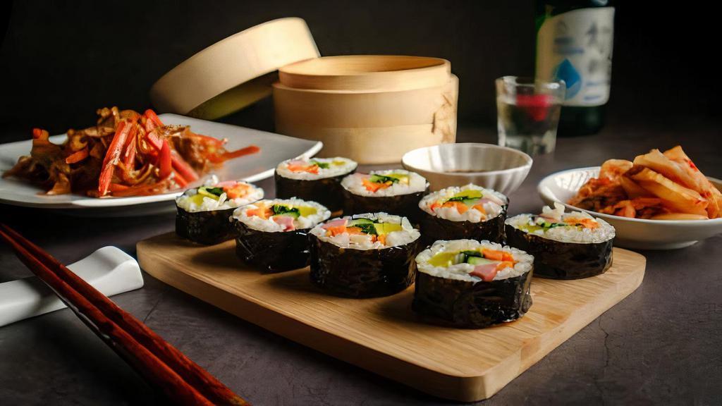 A5 Spicy Pork Kimbab · Spicy pork, lettuce, pickled radish, carrot and rice rolled in seaweed sheet.