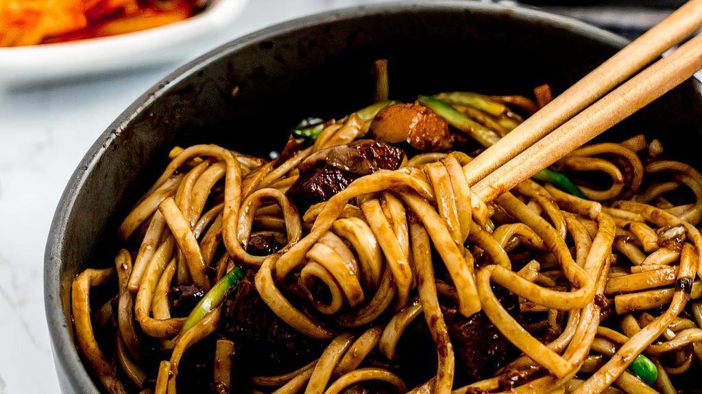 K27 Black Bean Noodle · Chinese - style Korean noodle dish topped with a thick sauce made of Chunjang (black bean), diced pork or beef, and vegetables.
