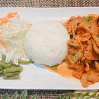 K2 Spicy Pork With Rice · Stir-fried pork marinated in spicy sauce served with veggies and side of rice.