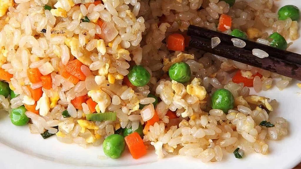 K5 Fried Rice With Veggies · Fried rice tossed with carrots, peas, zucchini, onions, and egg.