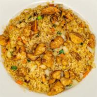House Chicken Fried Rice · Mixed carrot, onion and green onion fried rice and chicken.