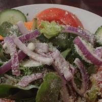 House Salad · Local mixed greens with carrots, cucumbers, tomatoes, red onion and parmesan cheese served w...