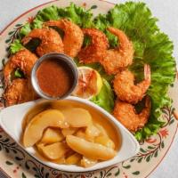Coconut Shrimp · Jumbo shrimp dipped in a coconut batter lightly fried, served with cherry mustard sauce.