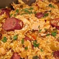 Jambalaya (Chicken & Beef Sausage) (16 Oz) · Item may be served hot or cold......a flavorful blend of onions bell pepper and celery slow ...