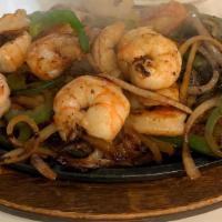 Fajitas De Camarón · Shrimp sizzling fajitas cooked with cactus,
bell peppers and onions garnished with cilantro ...