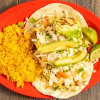 2 Fish Tacos · Soft flour or corn tortillas filled with fried tilapia topped with pico de gallo, lettuce, M...