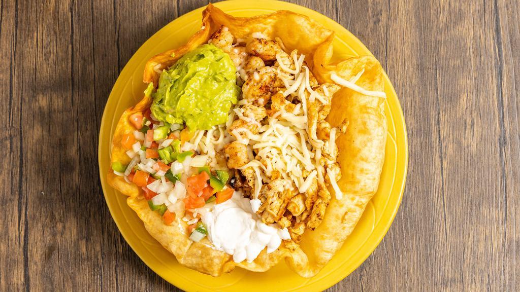 Kid Taco Salad · Crispy flour tortilla bowl filled with your choice of topping served with black refried beans, rice, Mexican cheese and fries on the side. Served with cheese dip.