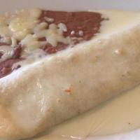 Burrito Especial · One beef and bean burrito topped with lettuce, tomatoes and sour cream.