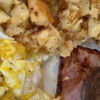 Breakfast Sampler · Two eggs, two bacon strips, grilled Virginia ham, sausage (link and patty), home fries or gr...
