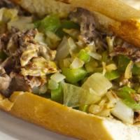 The Grilled Pepper Cheesesteak Sandwich · Delicious Philly steak sandwich loaded with grilled steak, melted cheese and grilled bell pe...