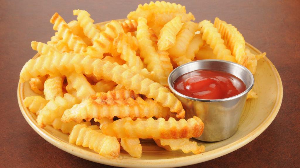 Crinkle Fries · Fresh crinkle fries seasoned with spicy red pepper, garlic, paprika, sugar, and a hint of lime.