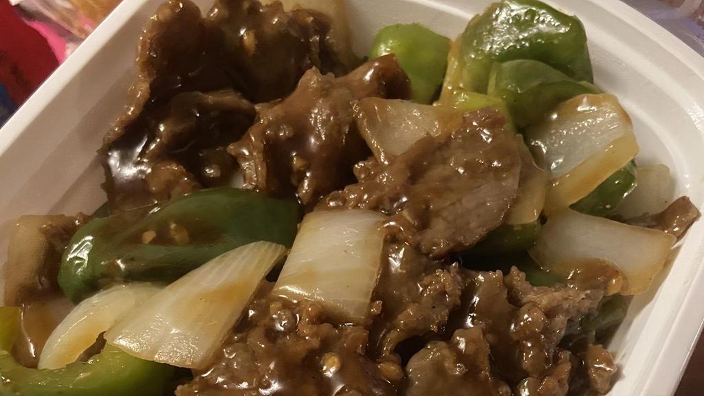 Green Pepper Steak · Served with steamed rice.