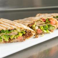 Falafel · vegetarian sandwich, made from scratch falafel smashed into our hummus and rolled in our mad...