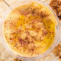 Spicy Hummus · Our classic hummus - with a kick