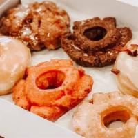Assorted Half Dozen Doughnuts · A half dozen will consist of yeast, cake, and up to two specialty doughnuts, specialties are...