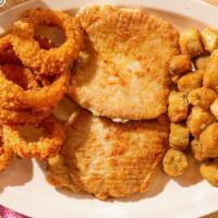 Pork Chop Plate · Two boneless pork chops, breaded and fried. Served with 2 sides and your choice of bread.