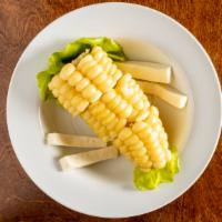 Choclo Con Queso · World's best corn steamed served with fresh white cheese.