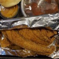 Catfish Sandwich · Dipped in seasoned meal and fried to perfection. Served with two pieces of bread.