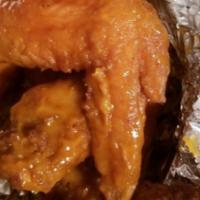 Bomb Wings · Ten wingettes seasoned and fried to perfection. Then tossed into a sauce or dry rub of your ...