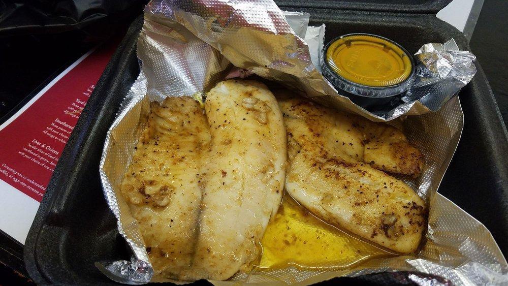 Tilapia Dinner · Tilapia dipped in seasoned meal and fried to perfection with your choice of two sides.