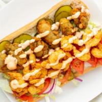 Fried Oyster And Shrimp Poe Boy · Lettuce, tomato, onion, pickle, and remoulade sauce.